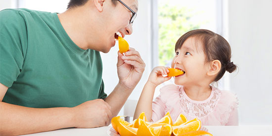 eating oranges for snack